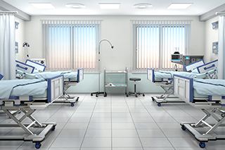 病床のある病院の部屋。